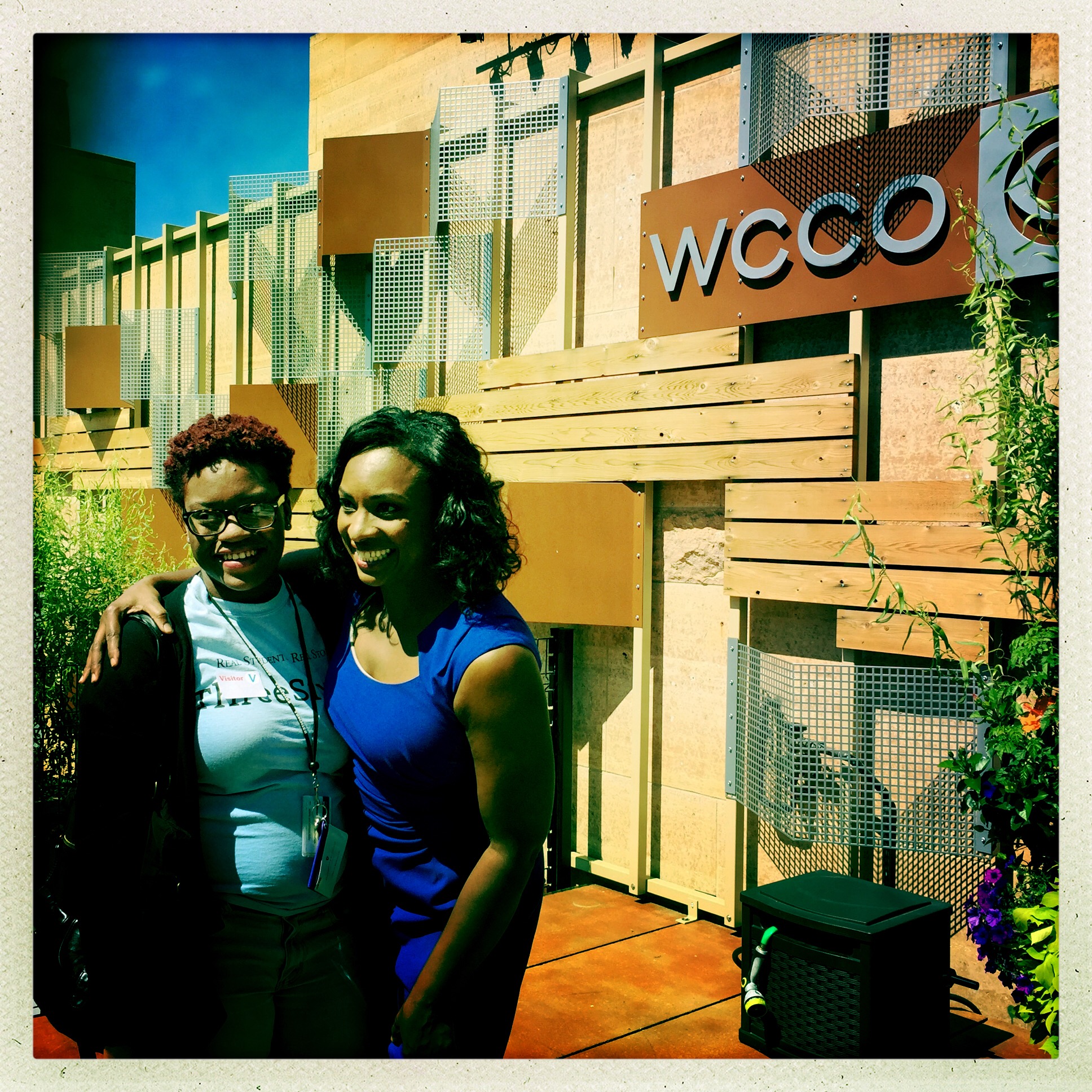 student and woman outside WCCO studio