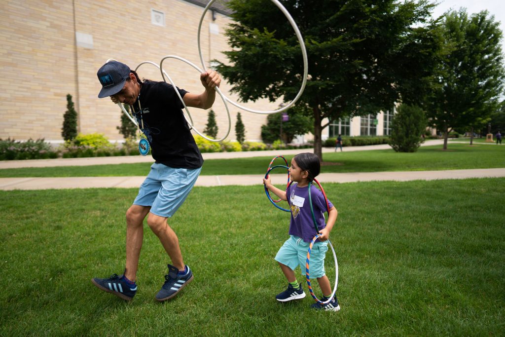 Micco Sampson and son, Nokose Sampson, 4, demonstrate a traditional Native American hoop dance. (Courtesy Mark VanCleave)