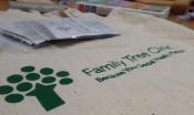 a canvas bag with the Family Tree Clinic logo