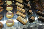 four rows of  chocolate and or cream dessert trays at Patisserie 46