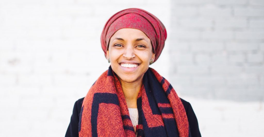 ilhan omar cropped standing in front of wall